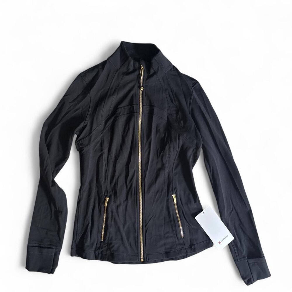 Lululemon define jacket nulu black
with gold size 10 brand new with tags